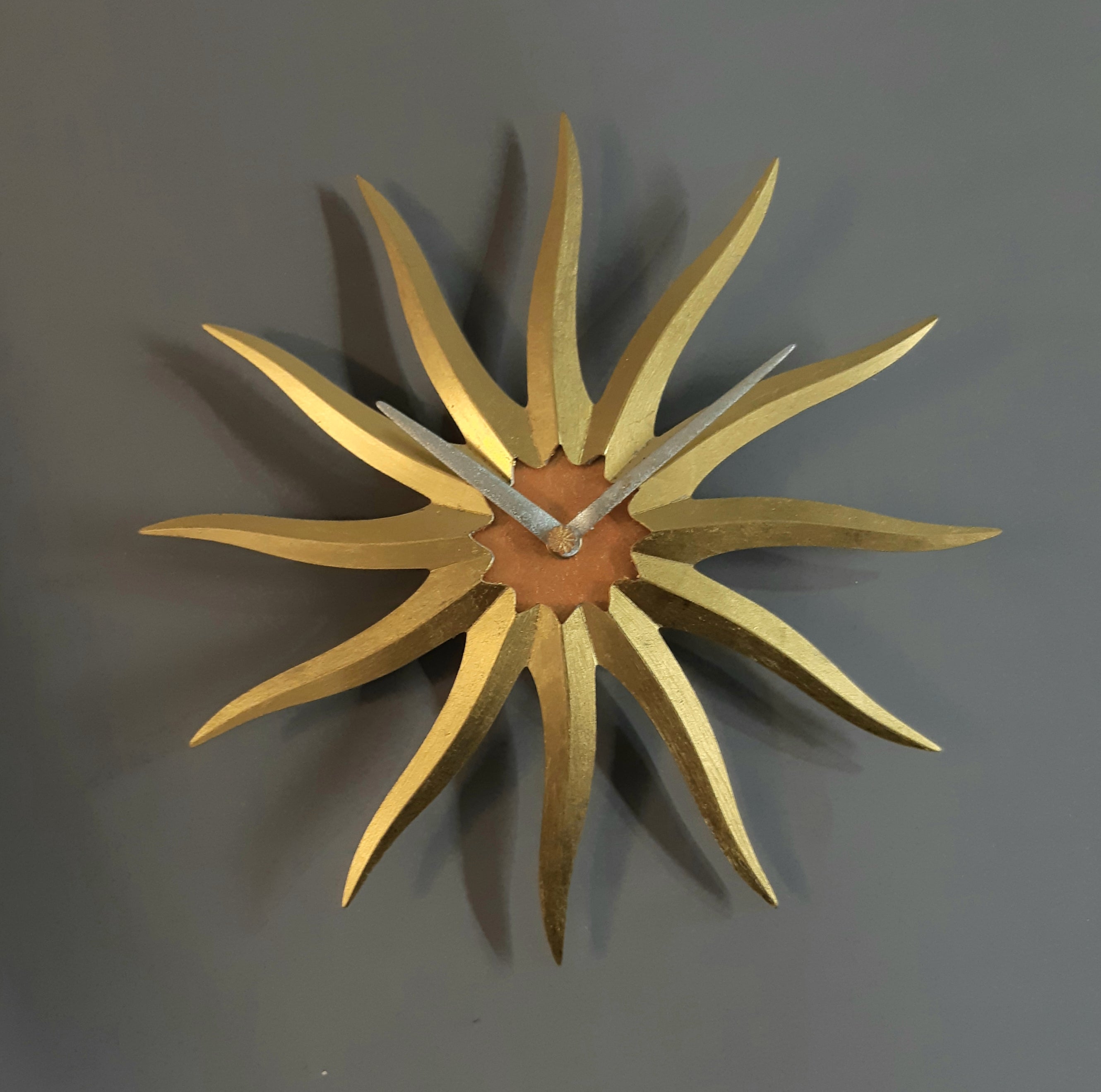 Wanduhr die Sonne